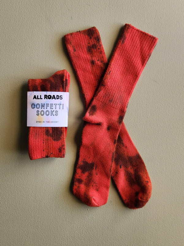 tie dyed socks in saturated tones of red. 