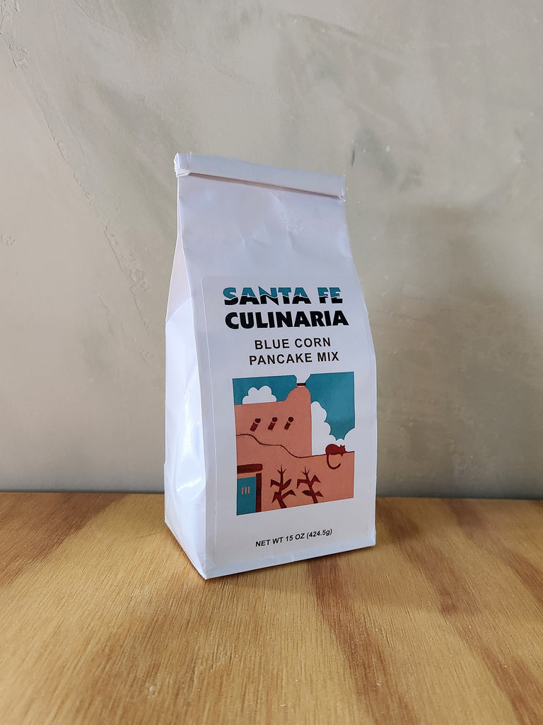 A 15 oz bag of sante fe culinaria's blue corn pancake mix.