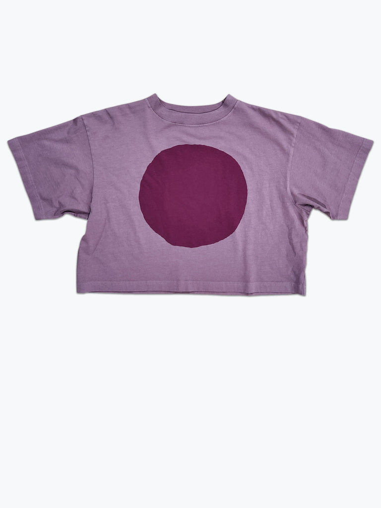 Boxy cropped t-shirt dyed dusty lavender with a large purple circle screen printed on the front.