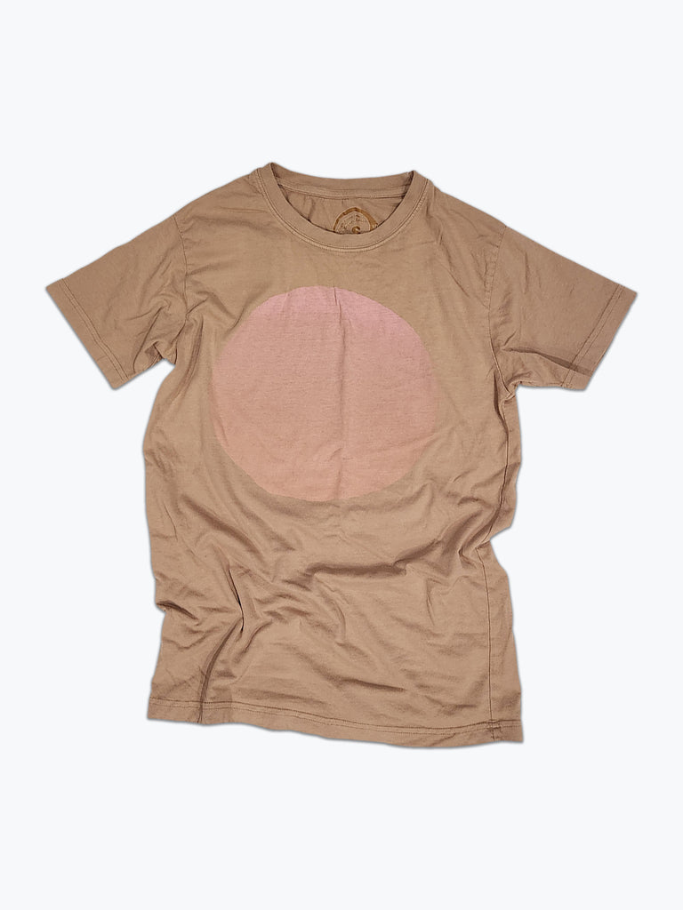 Tan t-shirt with a large, subtle faded pale pink circle printed on the front.