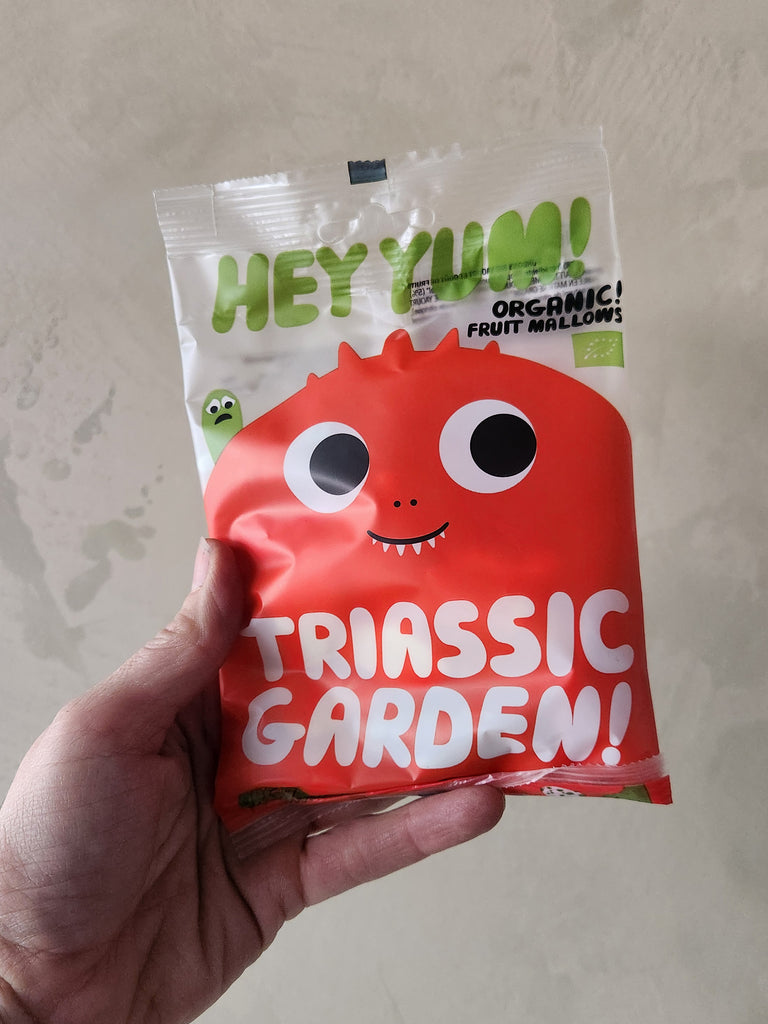 A bag of organic fruit dinosaur shaped gummy candies.