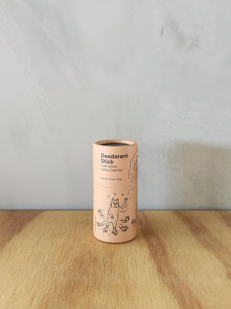 A natural deodorant in a cardboard tube with Cedar scent.