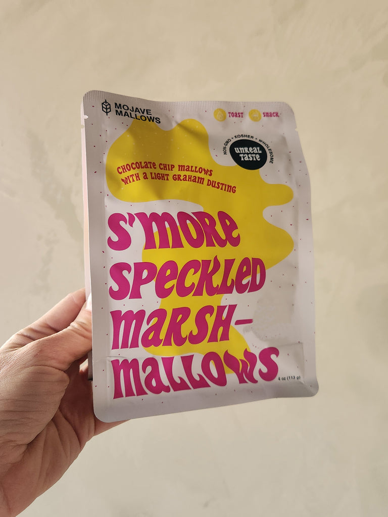 A 4oz bag of handmade marshmallows with a light dusting of graham crackers.