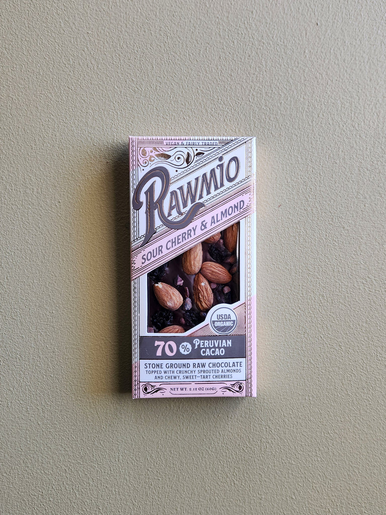 A dark chocolate bar embedded with almonds and dried sour cherries.